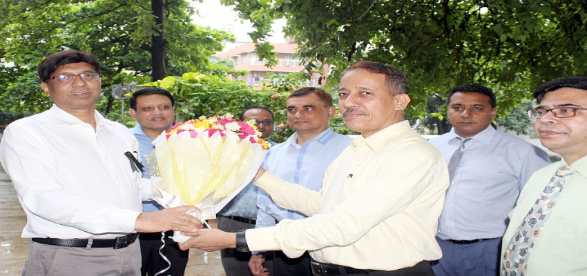 Officers of BIAM Foundation, Dhaka are welcoming newly joined Director General with flowers.